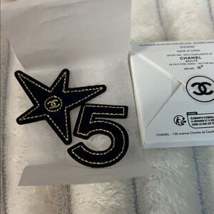 CHANEL Beaute Black and Gold Star and Number 5 Embellishments